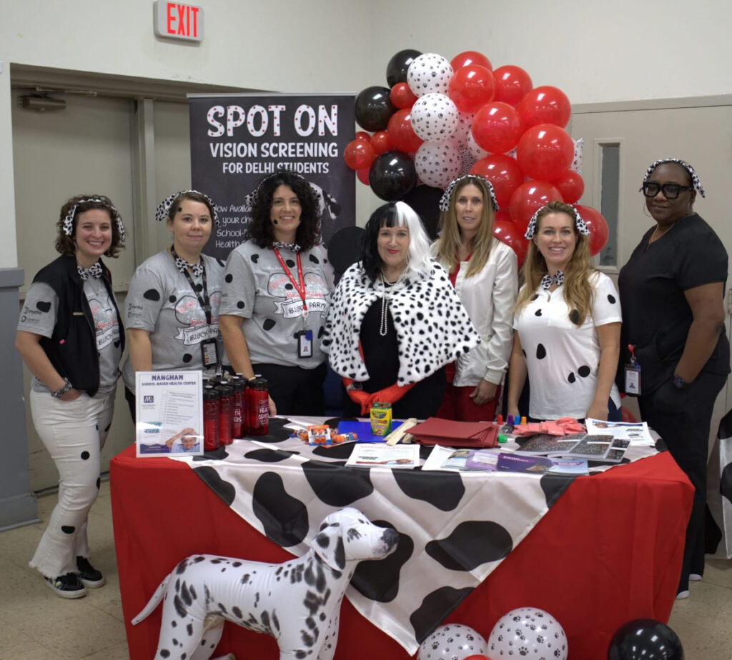 Delhi Community Health Center Staff at Block Party 2024, dressed up as 101 Dalmatians